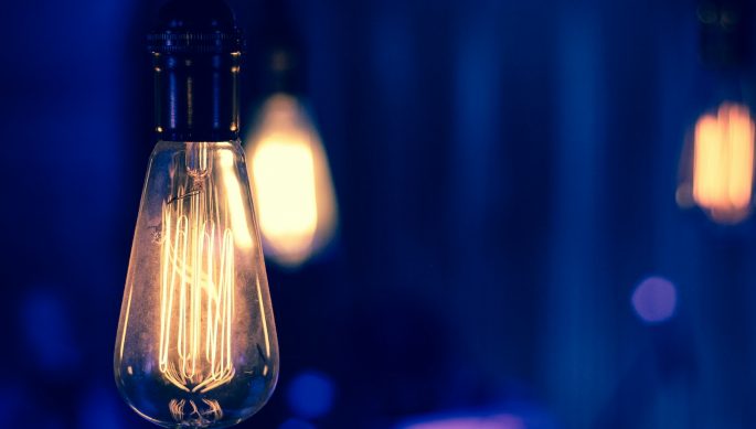 selective focus photography of light bulb